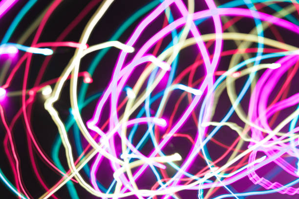 istock Abstract freezelight background from multicolored spiral stripes on a black 1367064894