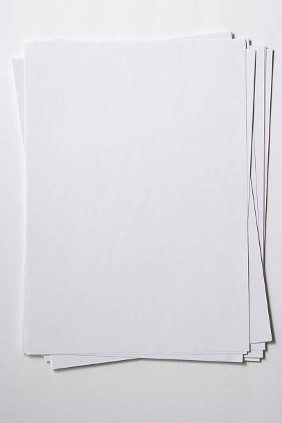 istock Isolated shot of stacked blank paper on white background 136706897