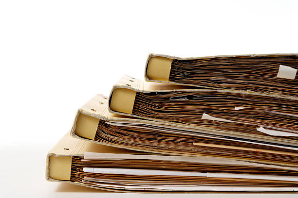 istock Isolated shot of stacked file folders on white background 136706948
