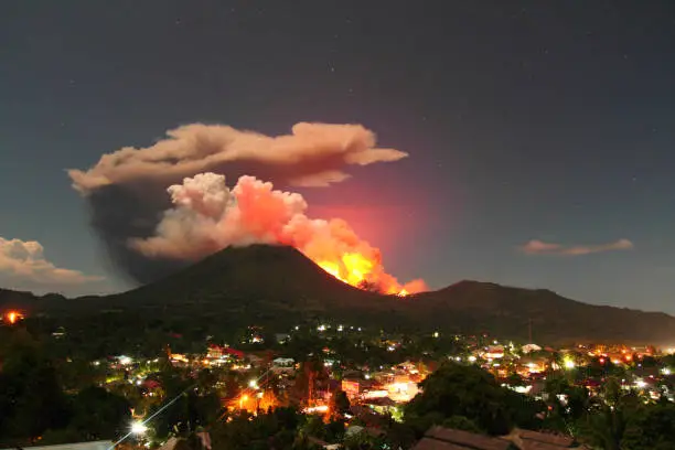 The eruption of Lokon mount in Tomohon, North Sulawesi at night, residents watched from the hills of the village with a distance of approximately 5 km. (July 14, 2011)