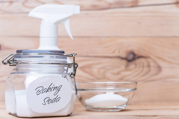 istock Baking soda on the wooden background. 1367077548