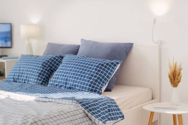istock bedroom in white and blue colors 1367087957