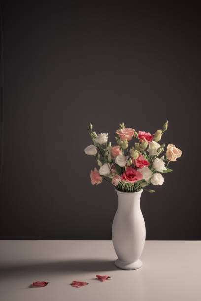 istock bouquet of eustoma on dark background 1367087960