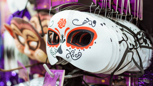 dia de los muertos, or in english, day of the dead masks for halloween for sale at a hypermarket or department store. - department store imagens e fotografias de stock