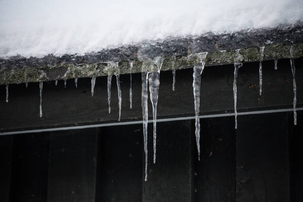 istock House with many icicles in winter day 1367096331