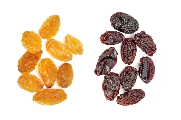 Photo of Dried raisins on white background