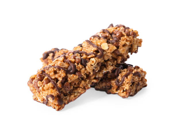istock Crunchy granola bars with chocolate on white background 1367101862