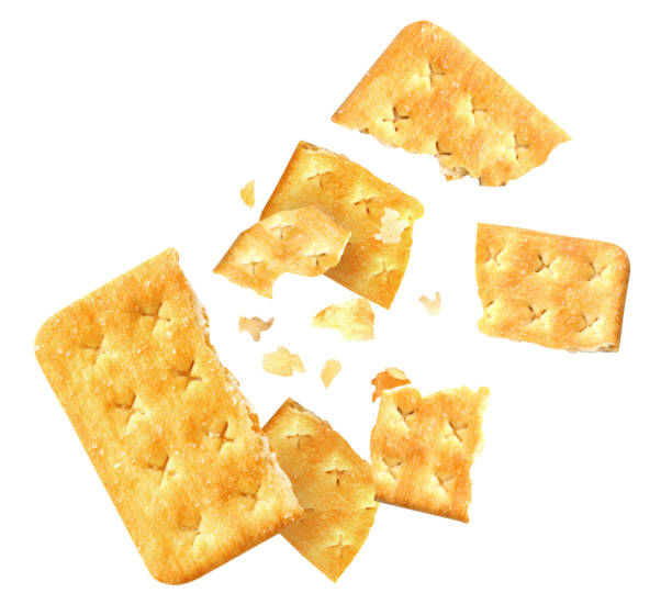 istock Crushed crackers and crumbs on white background 1367102702