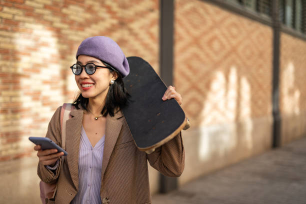 istock Urban city life, use a skateboard as transportation 1367105886