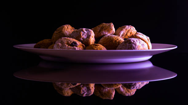 istock Fresh cookies on a plate on a black background 1367107497
