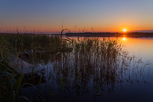 Vacations in Poland - Sunrise over the Jeziorak lake in Masuria, land of a thousand lakes
