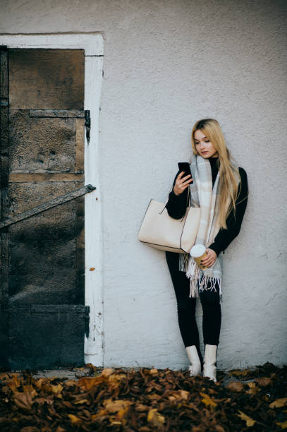 istock Young woman using the phone 1367113469