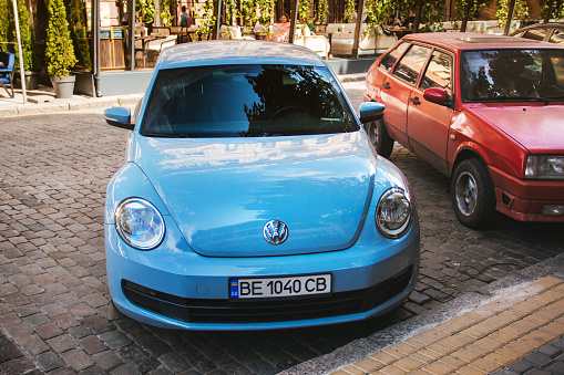 Odessa, Ukraine - September 5, 2021: Blue Volkswagen Beetle parked in the city