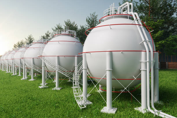 Close-up View Of Pressurized Gas Tanks Close-up View Of Pressurized Gas Tanks lng liquid natural gas stock pictures, royalty-free photos & images