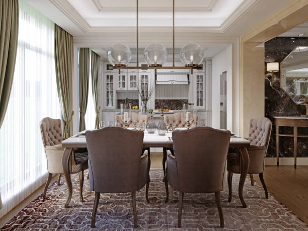 istock Classic kitchen dining room with dining table and white kitchen furniture. 1367117924