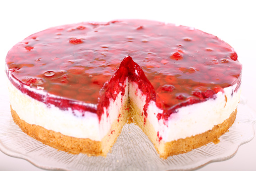 Raspberry cream layer cake on glass pan