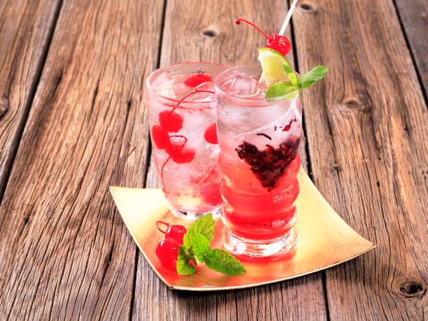 istock Glasses of iced drinks on a gold plate 136712200