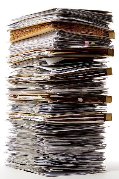istock Isolated shot of stacked many documents on white background 136712246