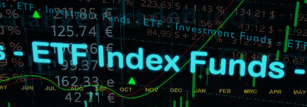 istock Exchange Index Funds illuminated on ETF trading screen with quotes, charts and percentages. 1367122611