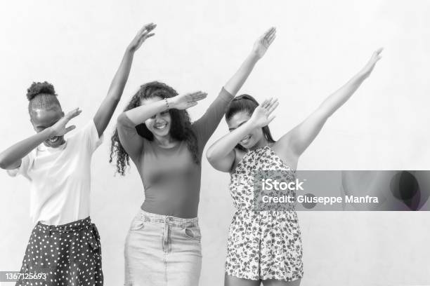 Three Nicelooking Gooddressed Cute Sweet Gorgeous Brunette Hair Lady Stand Isolated On White Wall Make Dabbing Movement Black And White Picture Stock Photo - Download Image Now