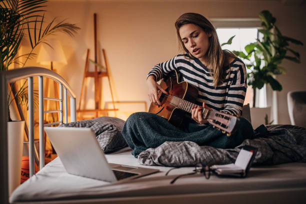 istock Female musician making a song 1367126004