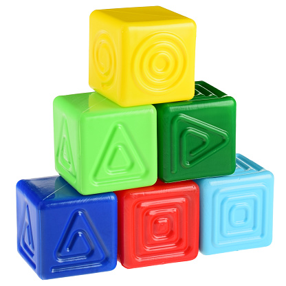 Plastic colored cubes for the game. Children's cubes with figures. Educational games for the child. Safe Toys