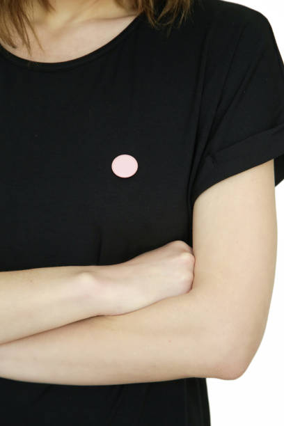 istock Small button badge pinned onto black shirt 1367131987