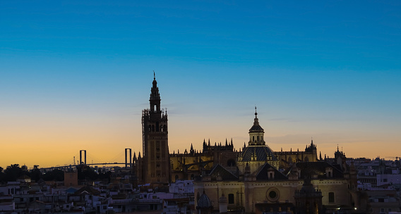 Sunset skyline view with a cityscape at Seville Cathedral ,Spain