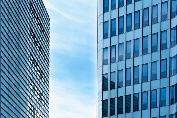 istock City downtown office buildings on the blue sky background. 1367134255