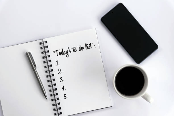 istock Today's to do list with numbers on an open page book. 1367136888