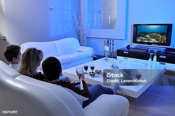 Watching Tv Stock Photo - Download Image Now - Family, Lifestyles, Television Set