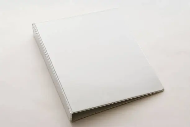 White blank ring binder isolated on on white background.