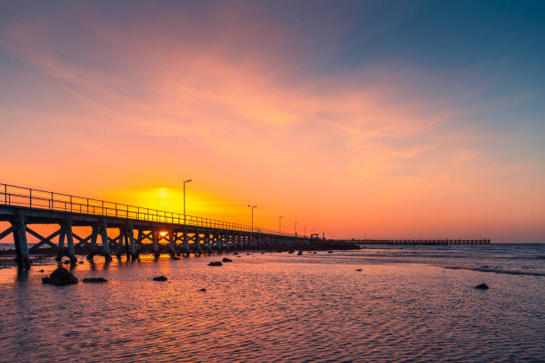 Moonta Bay pier viewed against sunset , Yorke Peninsula,  South Australia