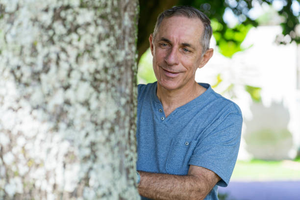istock Man Hugs a Tree as a Treatment for Anxiety 1367145760