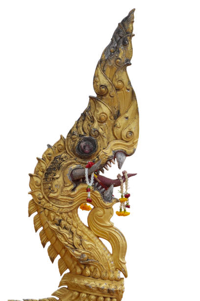 An old serpent or serpent statue in a Thai temple isolated on white background.