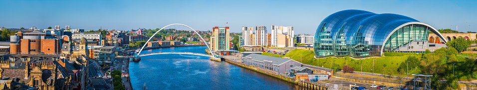 Aerial panorama over the River Tyne, Newcastle quayside and Gateshead Millennium Bridge, Tyne and Wear, UK.