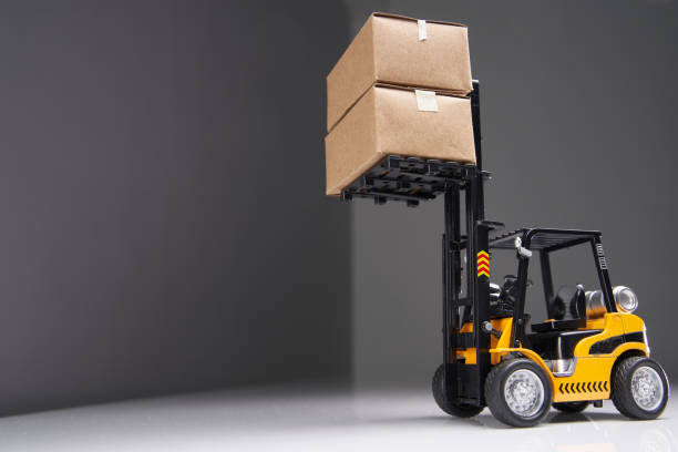 toy yellow forklift uploading goods