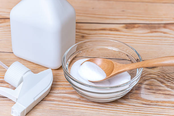 Put baking soda into the container. stock photo