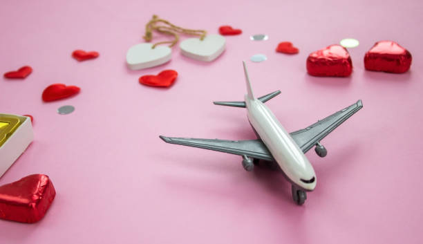istock layout on pink background valentine's day. Airplane travel 1367157454