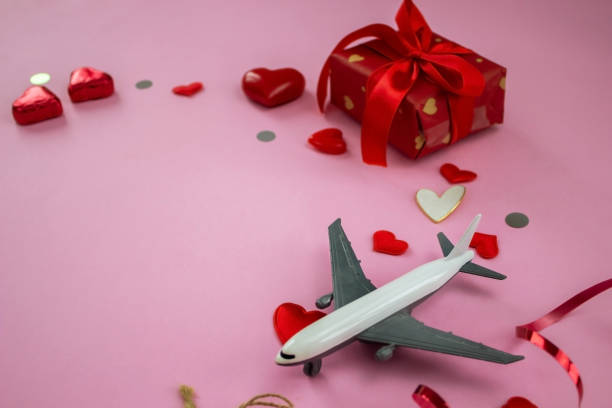 istock layout on pink background valentine's day. Airplane travel 1367157459