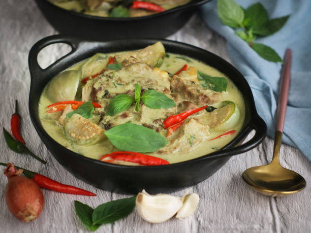 istock Thai traditional green curry with lamb and eggplant 1367157526