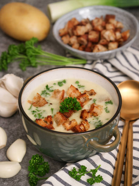 istock Creamy garlic soup top with bread croutons 1367157641