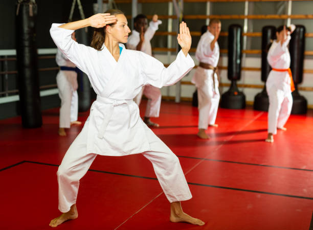 istock Woman in kimono is practicing karate moves 1367158197