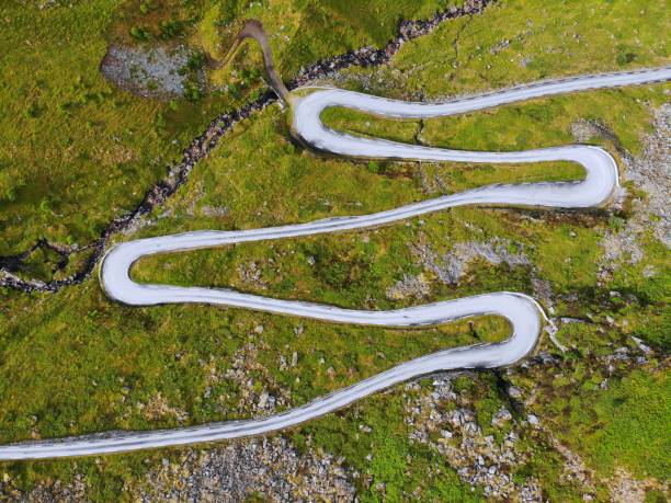 Winding road drone view in Norway stock photo