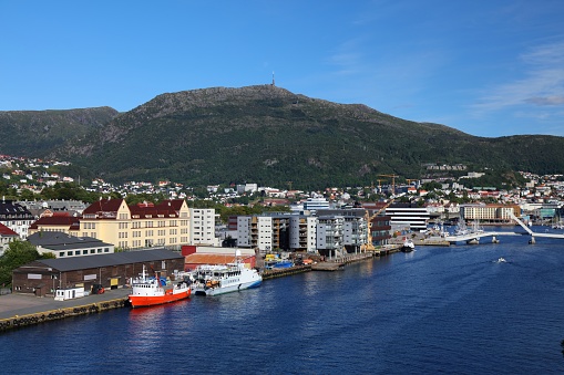 Bergen city, Norway. Cityscape of Mohlenpris district with Ulriken mountain in background.