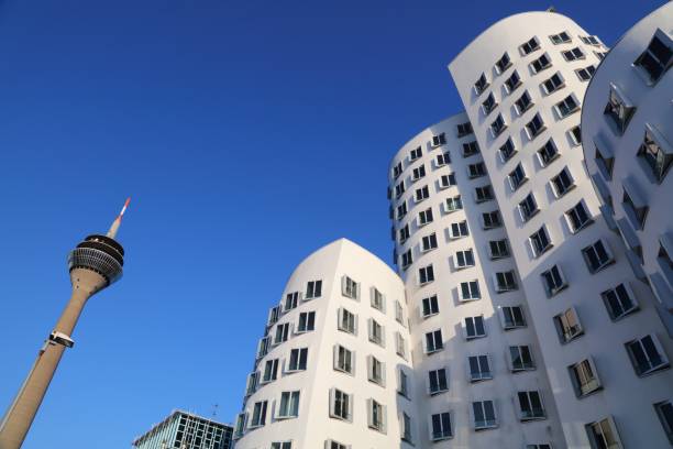 Neuer Zollhof modern architecture in Dusseldorf, Germany. The residential complex was designed by American architect Frank Gehry in 1998.