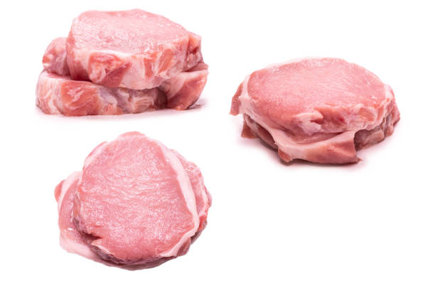 istock Raw pork pieces isolated on a white background. 1367162674