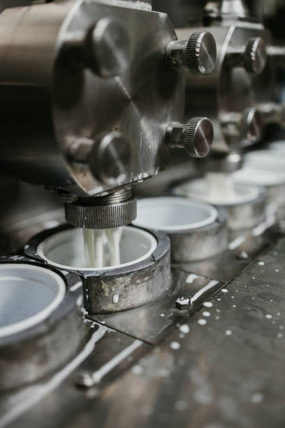 Food factory production line Factory production line for different dairy products such a sour cream or sour milk manufacturing. dairy producer stock pictures, royalty-free photos & images