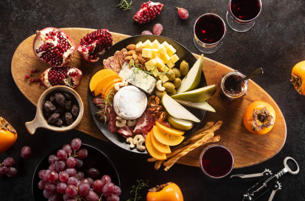 istock Red wine tasting accompanied with deli snacks 1367163990