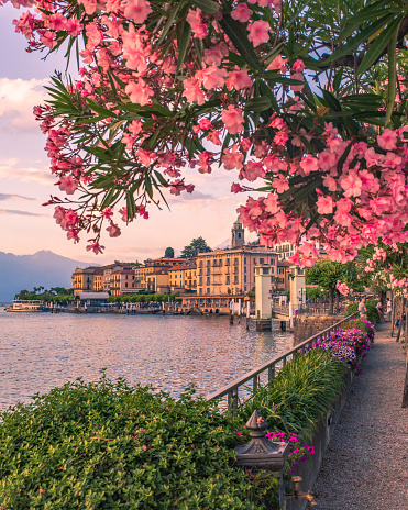 Doors opening to views of Lake Como in Italy.